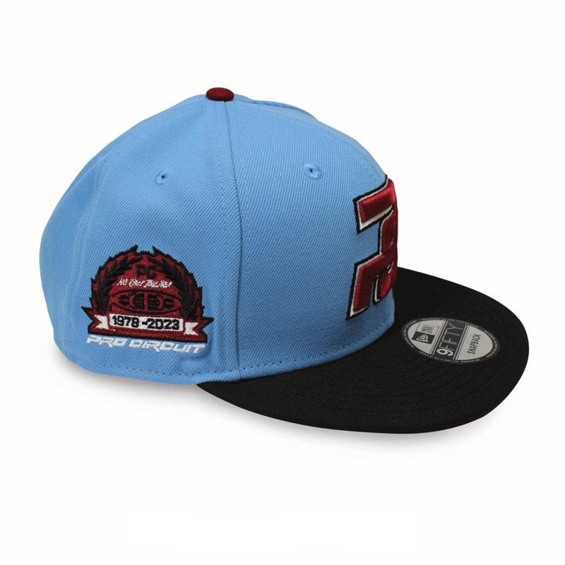 PRO CIRCUIT Snapback Pet - Sky/Zwart/Cardina